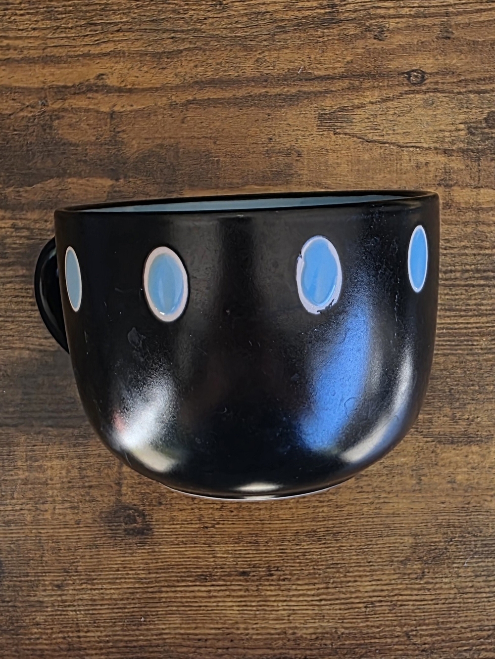 Black Ceramic Mug with Light Blue Dot Accents